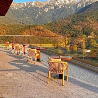 Terrace chair in rattan with armrests Blanco